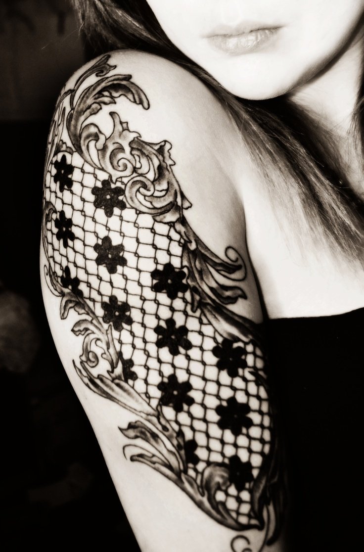 Lace armband tattoo on the right upper arm