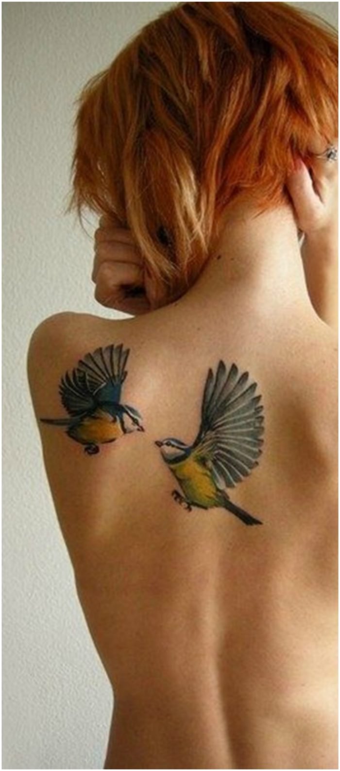 Bird back tattoo